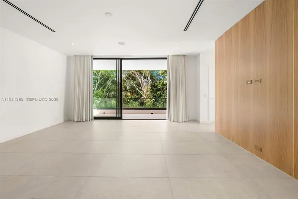 a kitchen with granite countertop a sink and a stove