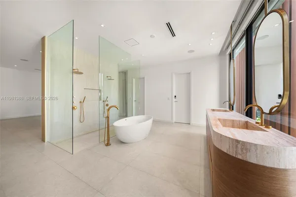 a bathroom with a toilet a sink and a bathtub