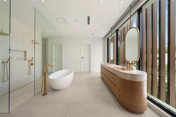 a view of a balcony with wooden floor and outdoor space