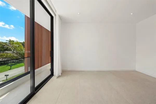 an aerial view of a house with a garden
