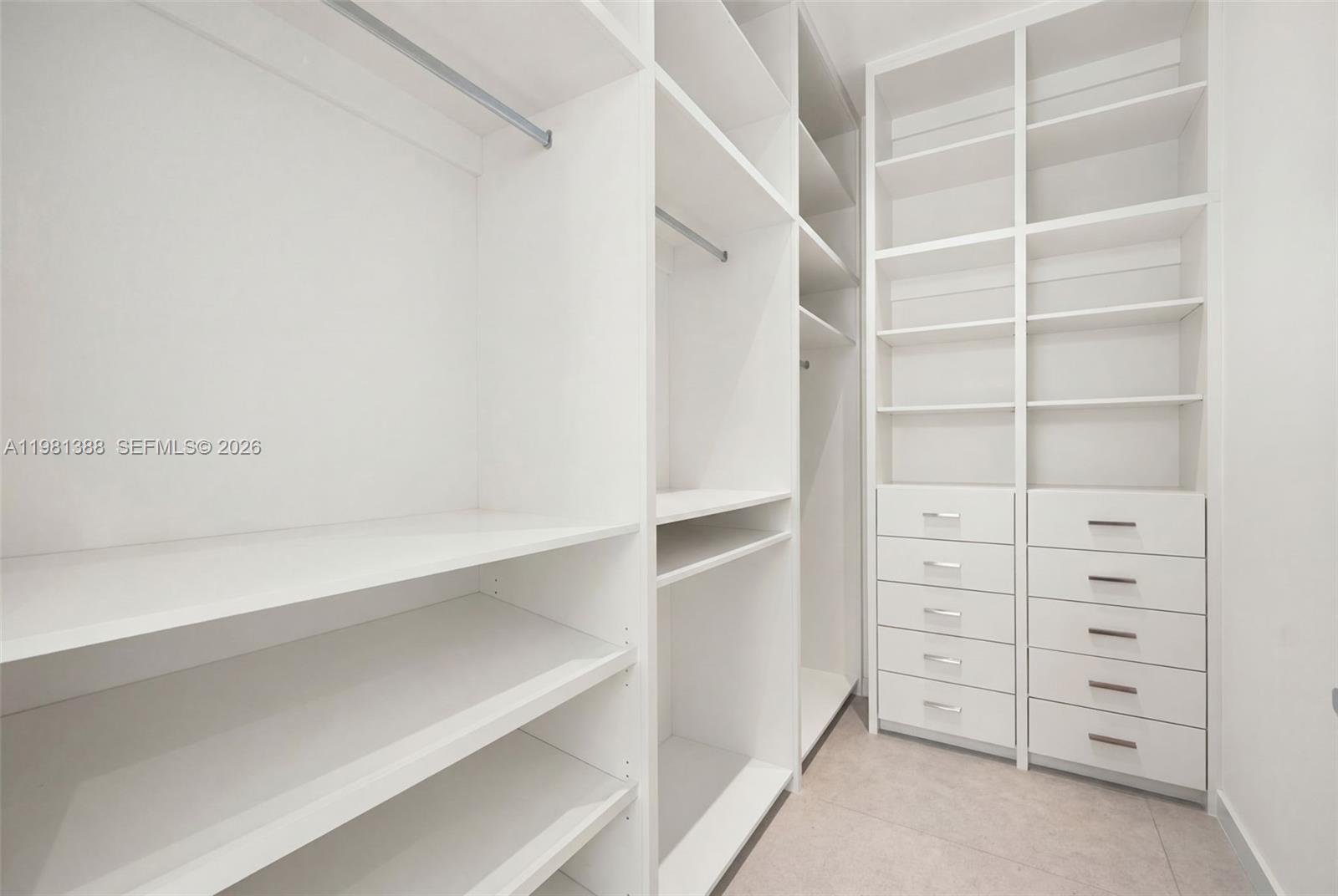 7700 Southwest 50th Court Miami, FL 33143 - Photo 53 of 62 a view of an empty walk in closet
