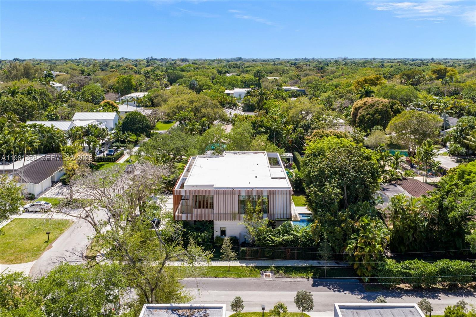 7700 Southwest 50th Court Miami, FL 33143 - Photo 62 of 62 an aerial view of a house with a garden