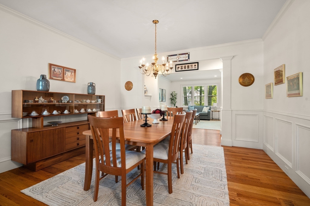 287 Langley Road, Unit 43 Newton, MA 02459 - Photo 5 of 36 a view of a dining room with furniture