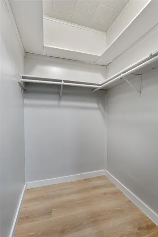 a view of an empty walk in closet