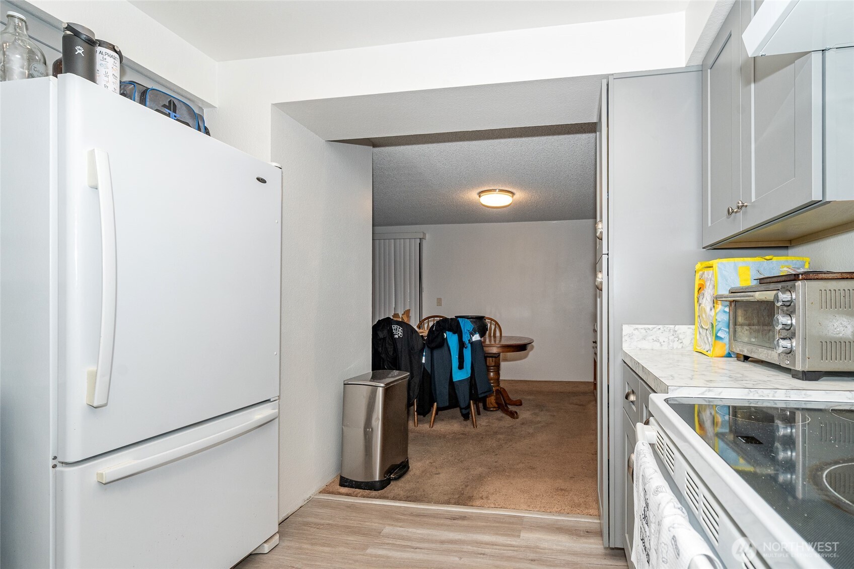 2119 Southwest Olympic Drive Chehalis, WA 98532 - Photo 14 of 33 a kitchen with a refrigerator and a sink