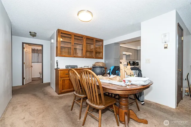 a view of a dining room with furniture
