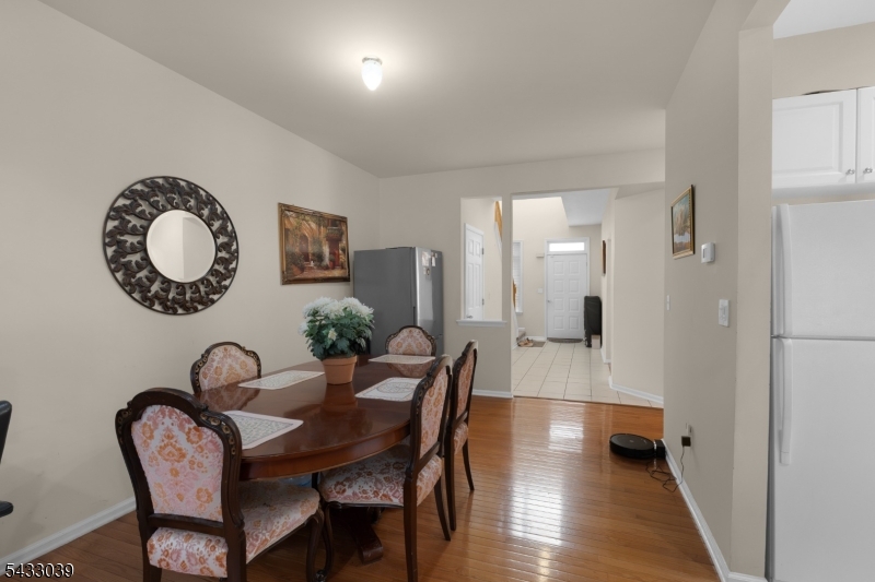 158 Autumn Ridge Road Morris Plains, NJ 07950 - Photo 10 of 26 a view of a dining room with furniture and a rug