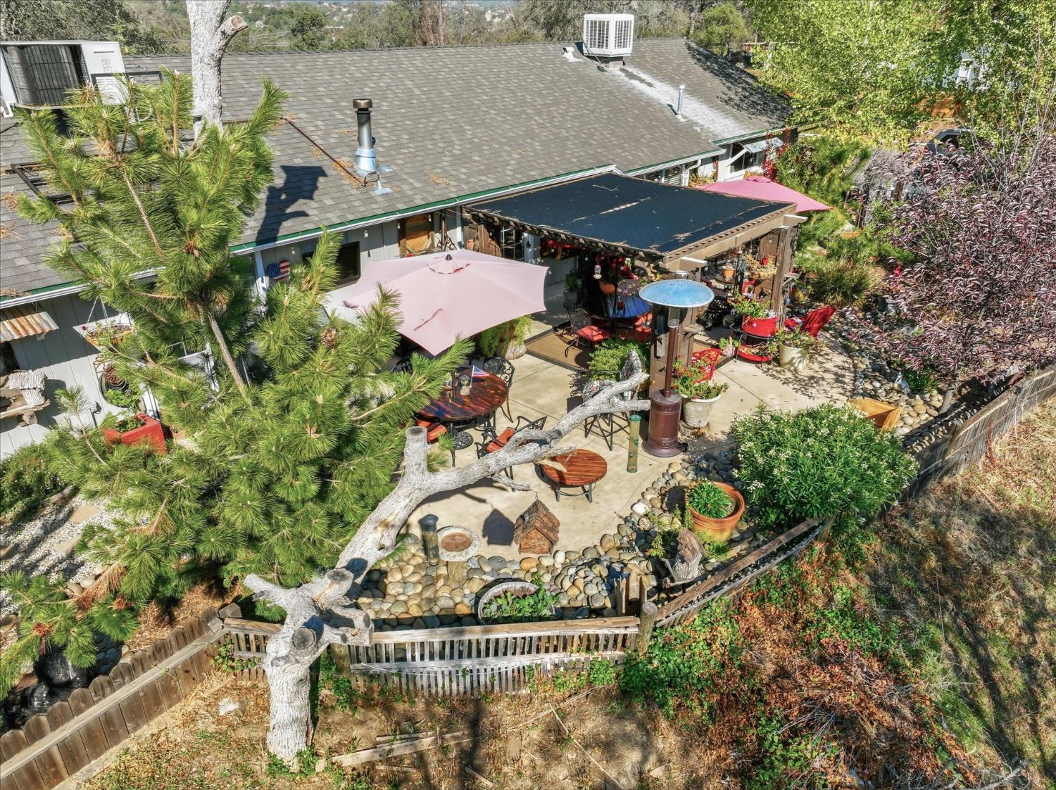 32583 River Knolls Road Coarsegold, CA 93614 - Photo 58 of 63 an aerial view of a house with an outdoor space swimming pool