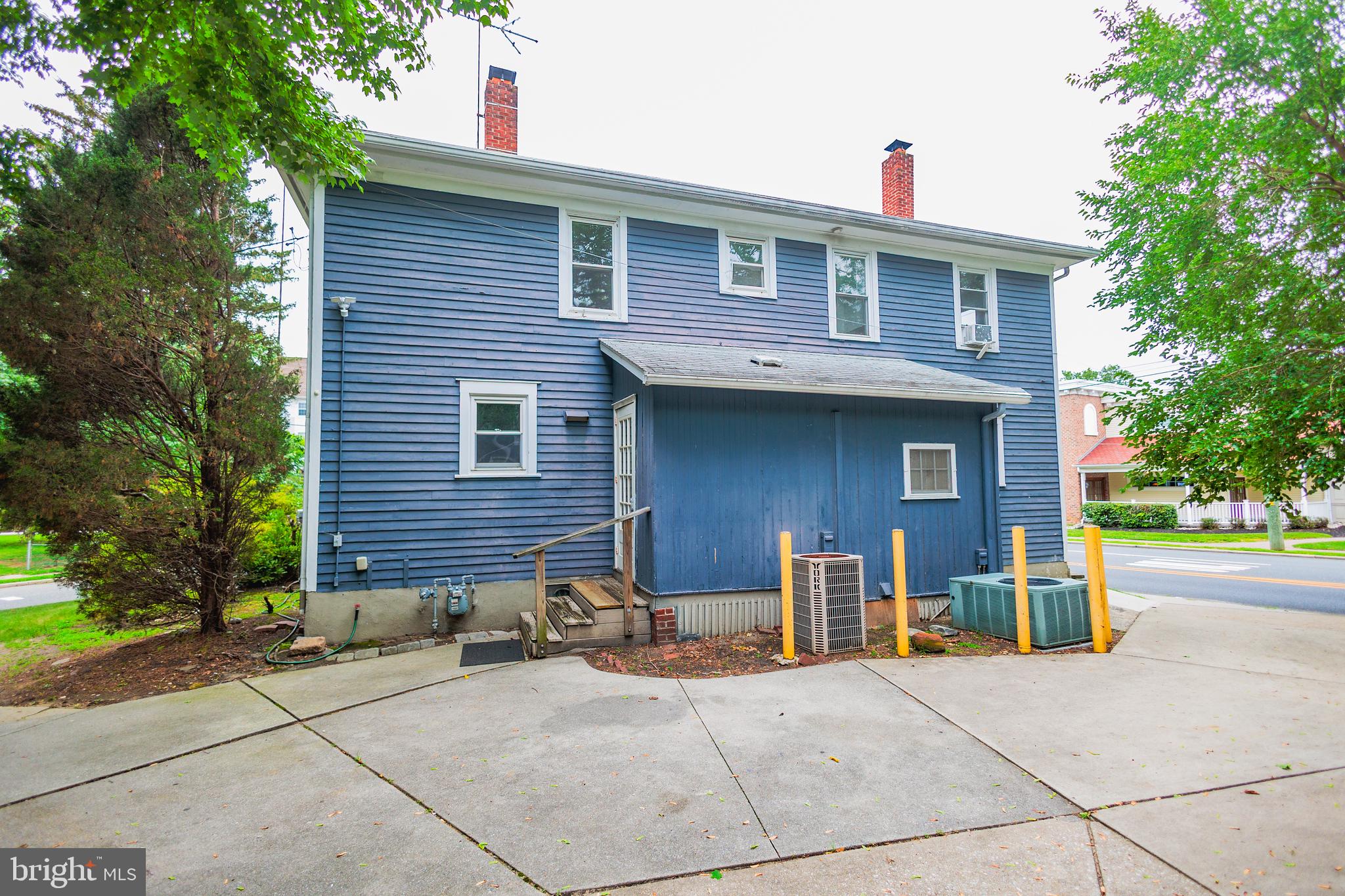 130 State Street Glassboro, NJ 08028 - Photo 4 of 17 a front view of a house with yard and trees