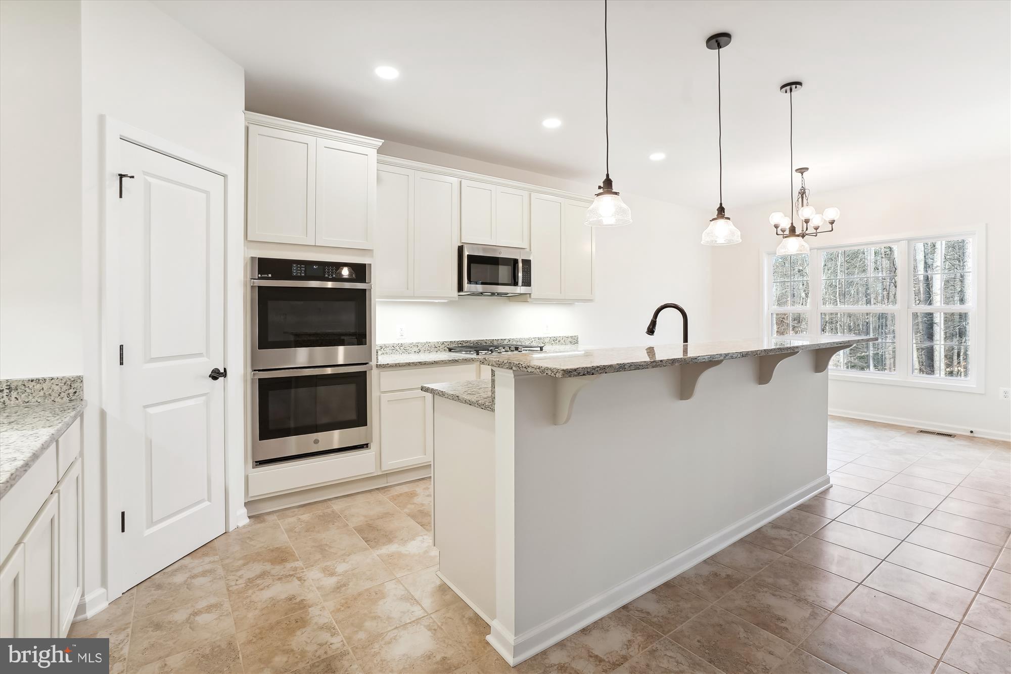 1 A Old Stillhouse Road Boston, VA 22713 - Photo 17 of 42 a kitchen with stainless steel appliances granite countertop a stove a sink and a refrigerator