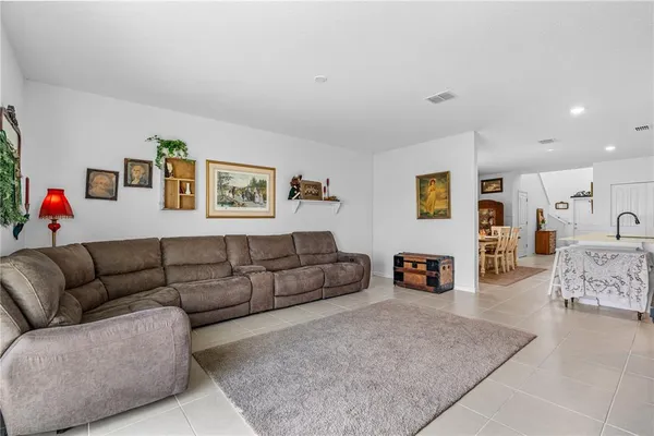 a living room with furniture and a couch