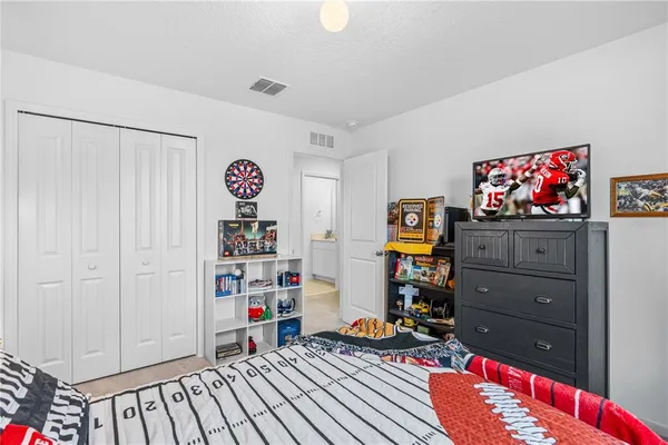 a view of a workspace with furniture and toys