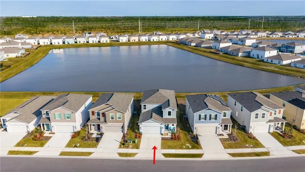 a view of residential houses with outdoor space