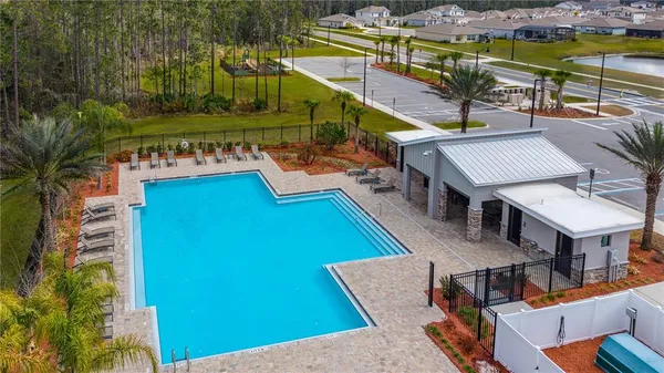 an aerial view of a house with a garden