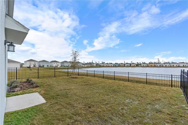 a view of a lake with a large trees