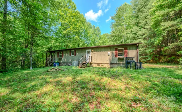 a house view with a backyard space