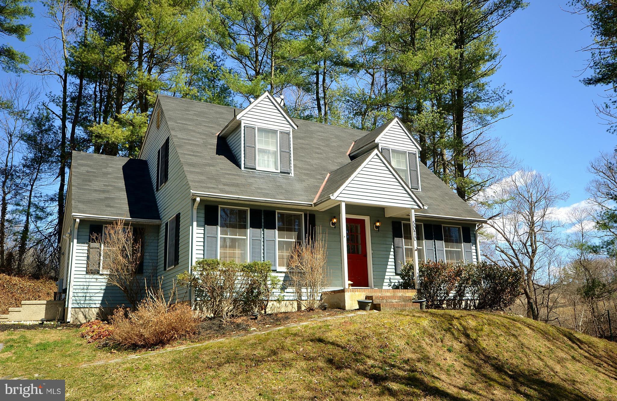 5070 Shaffer Mill Road Manchester, MD 21102 - Photo 1 of 30 a front view of a house with a yard