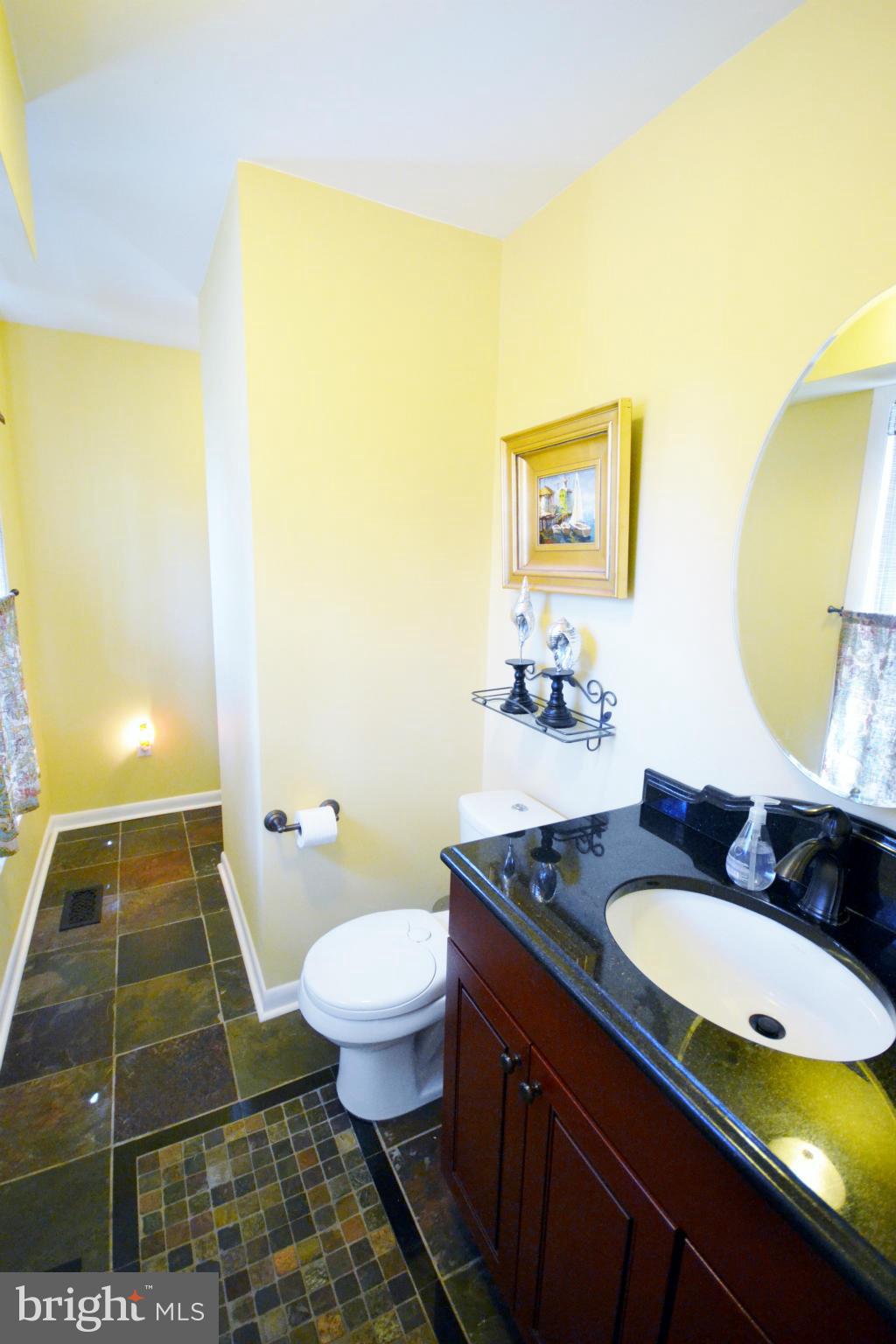 5070 Shaffer Mill Road Manchester, MD 21102 - Photo 13 of 30 a bathroom with a sink and a mirror