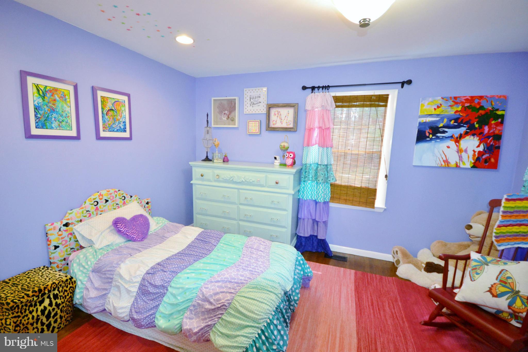 5070 Shaffer Mill Road Manchester, MD 21102 - Photo 17 of 30 a bedroom with a bed and wooden floor