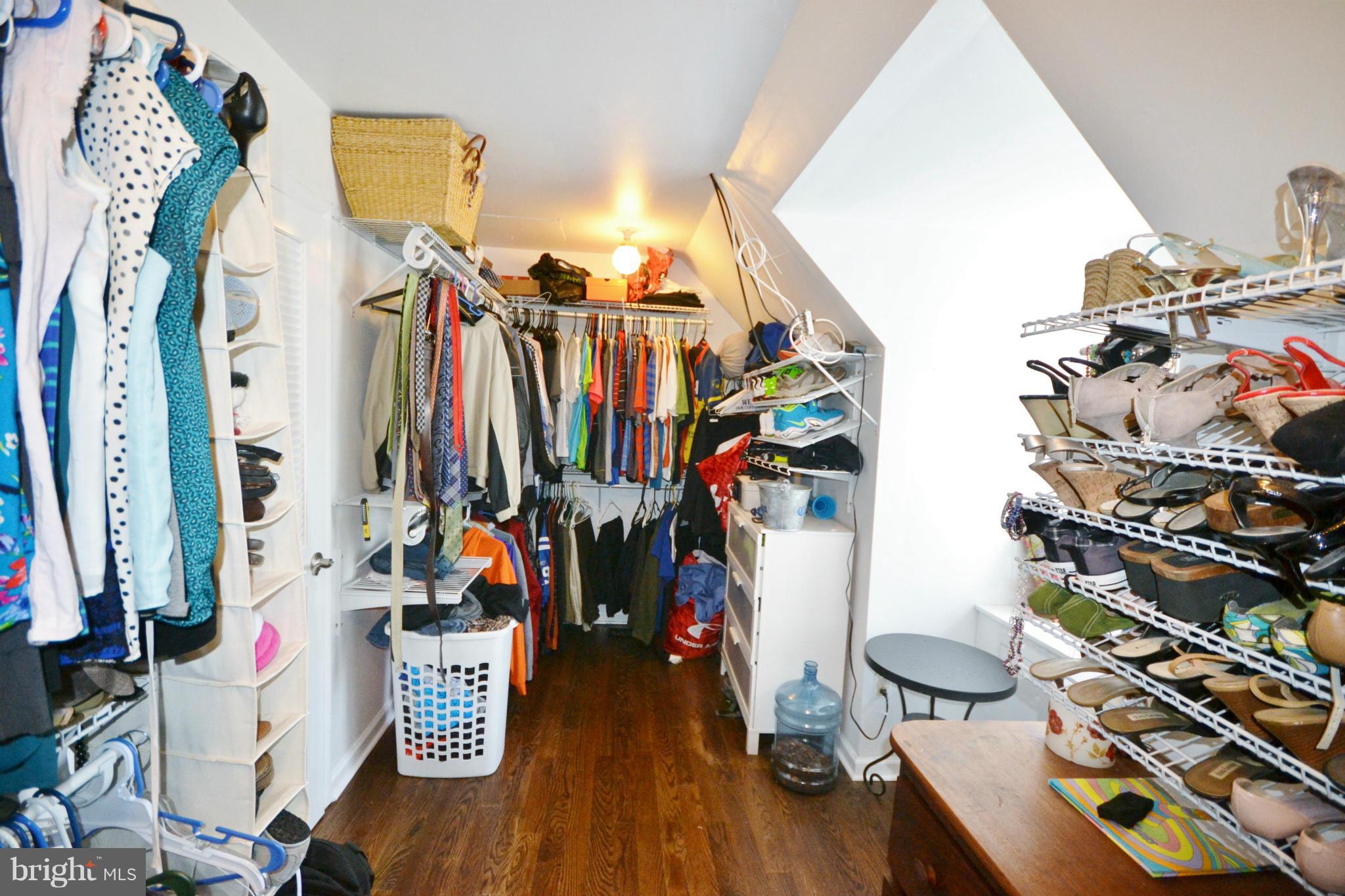 5070 Shaffer Mill Road Manchester, MD 21102 - Photo 18 of 30 a view of walk in closet with clothes and shoes