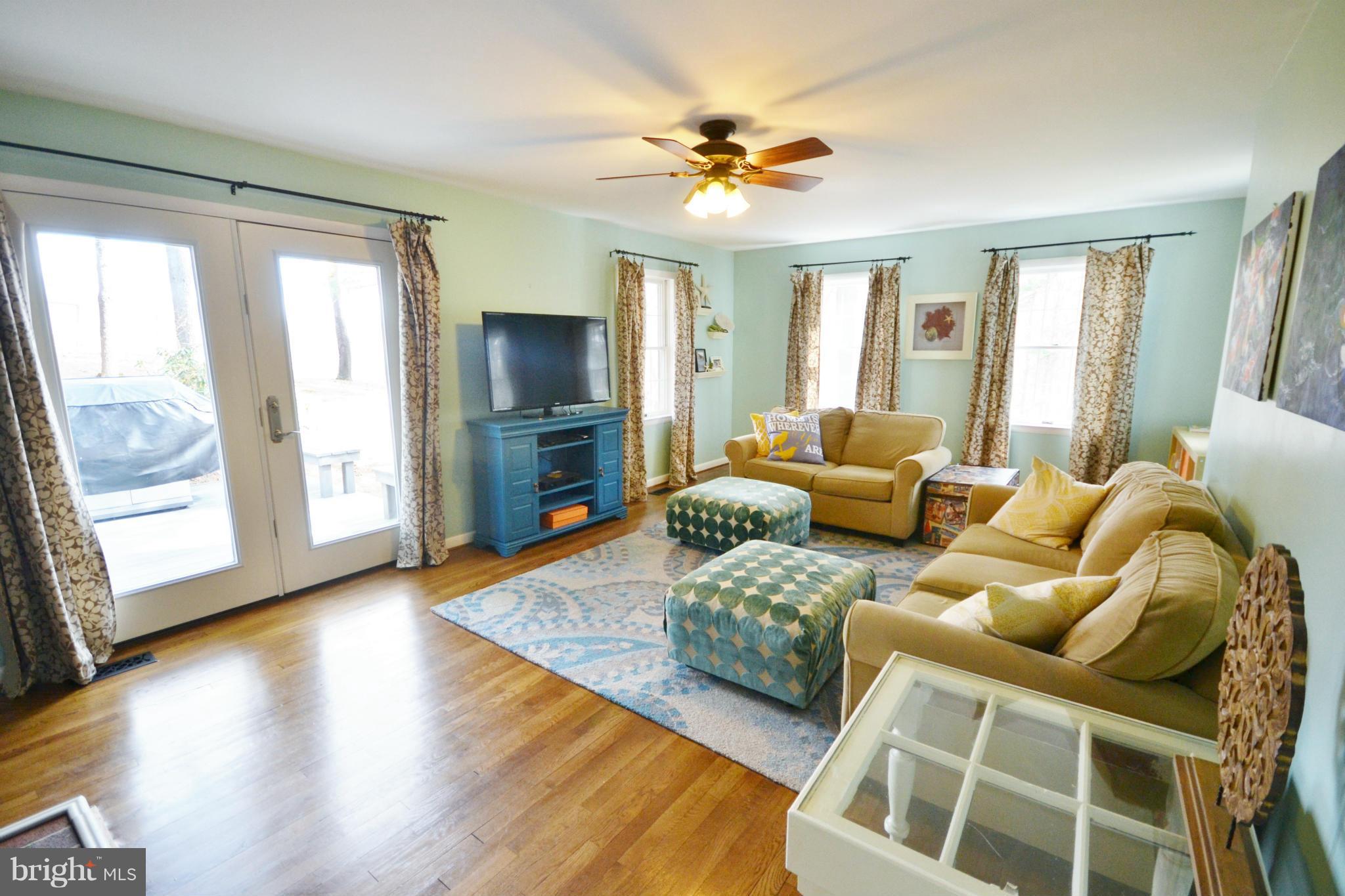 5070 Shaffer Mill Road Manchester, MD 21102 - Photo 3 of 30 a living room with furniture and a window