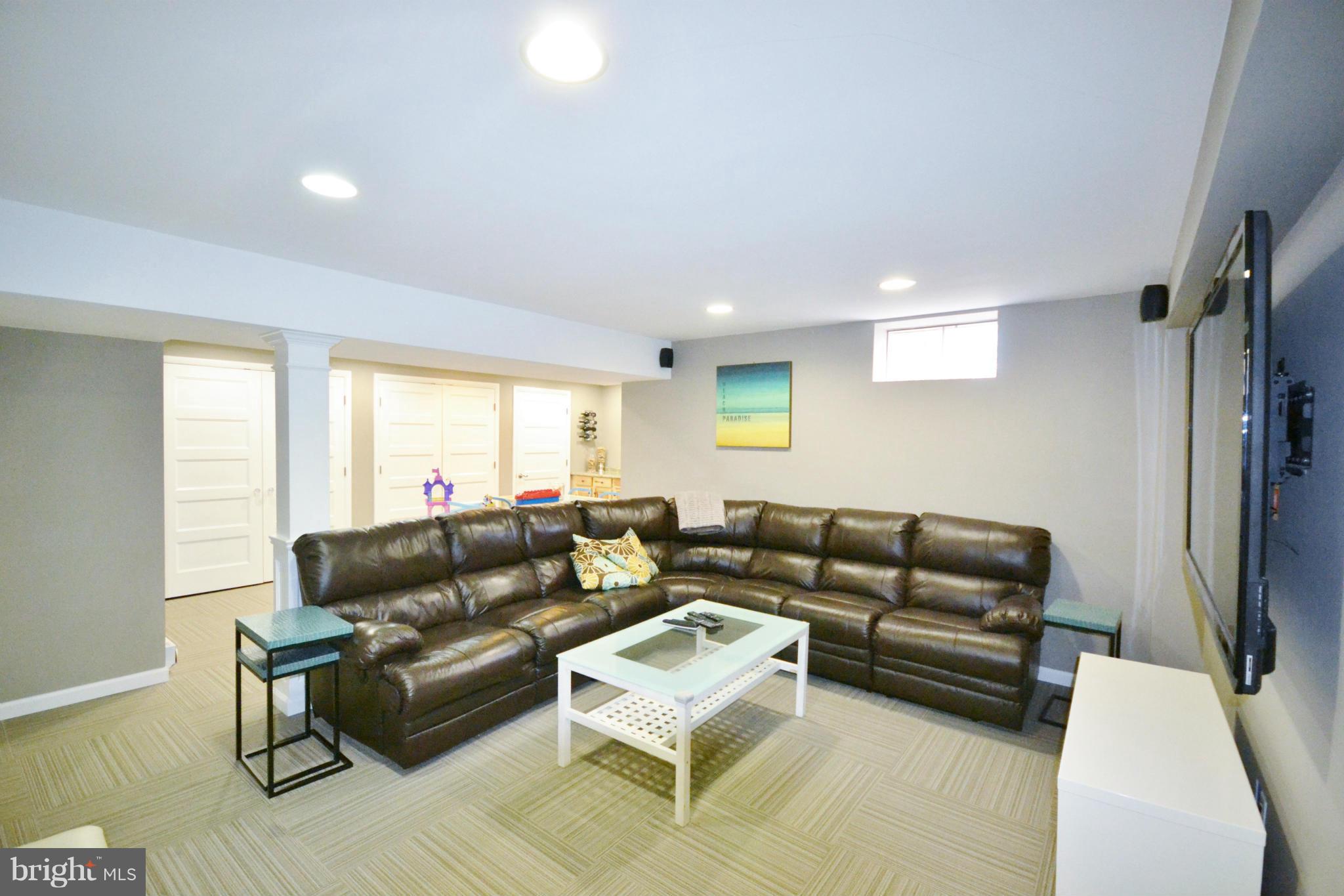 5070 Shaffer Mill Road Manchester, MD 21102 - Photo 4 of 30 a living room with furniture window and a flat screen tv