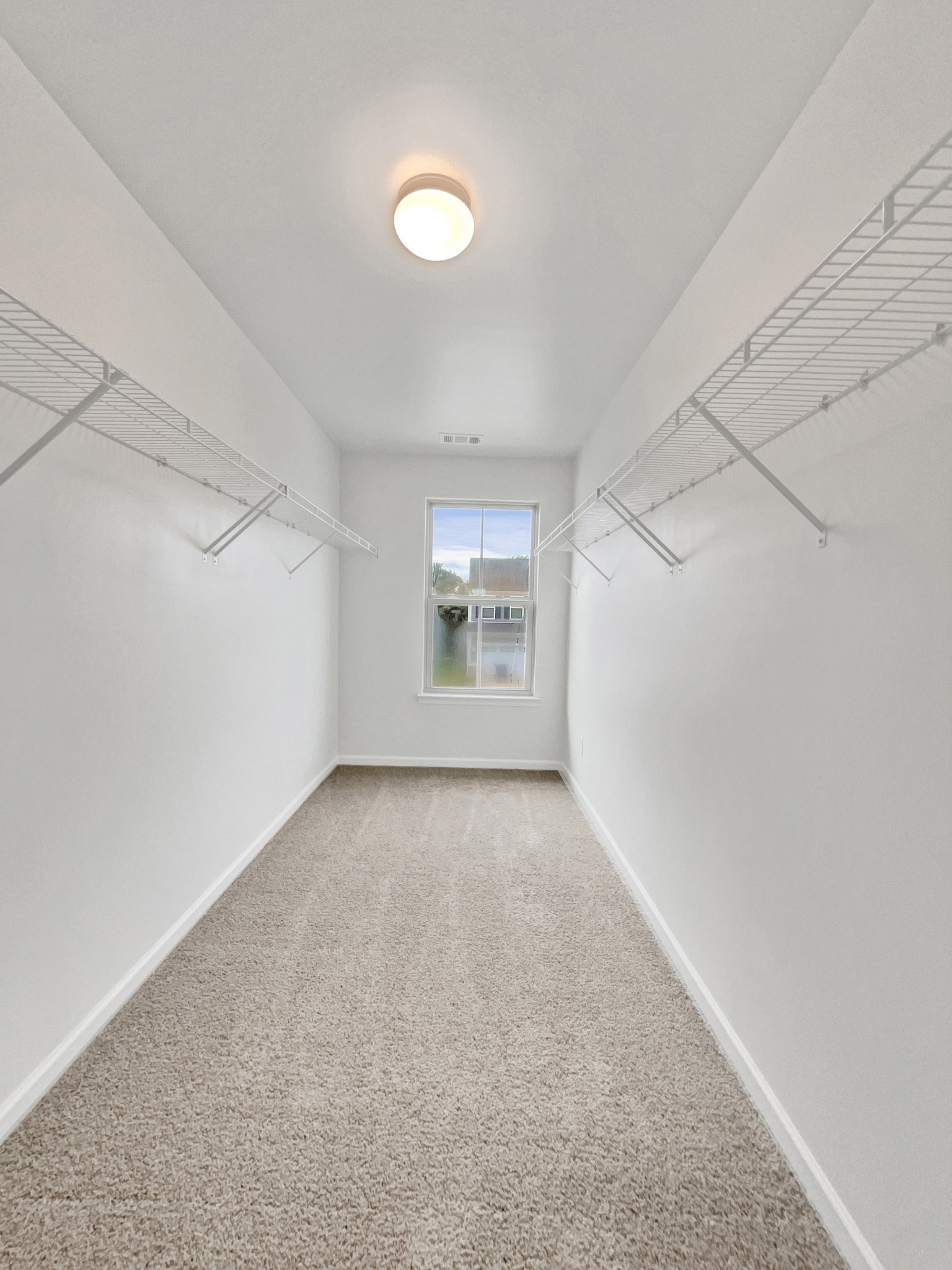 2817 Winterberry Drive Columbia, TN 38401 - Photo 17 of 26 a view of a big room with windows and cabinet