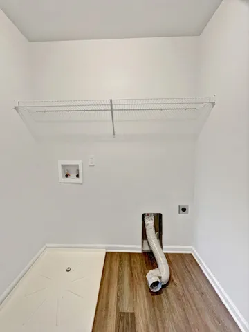 a view of a room with racks on the wall