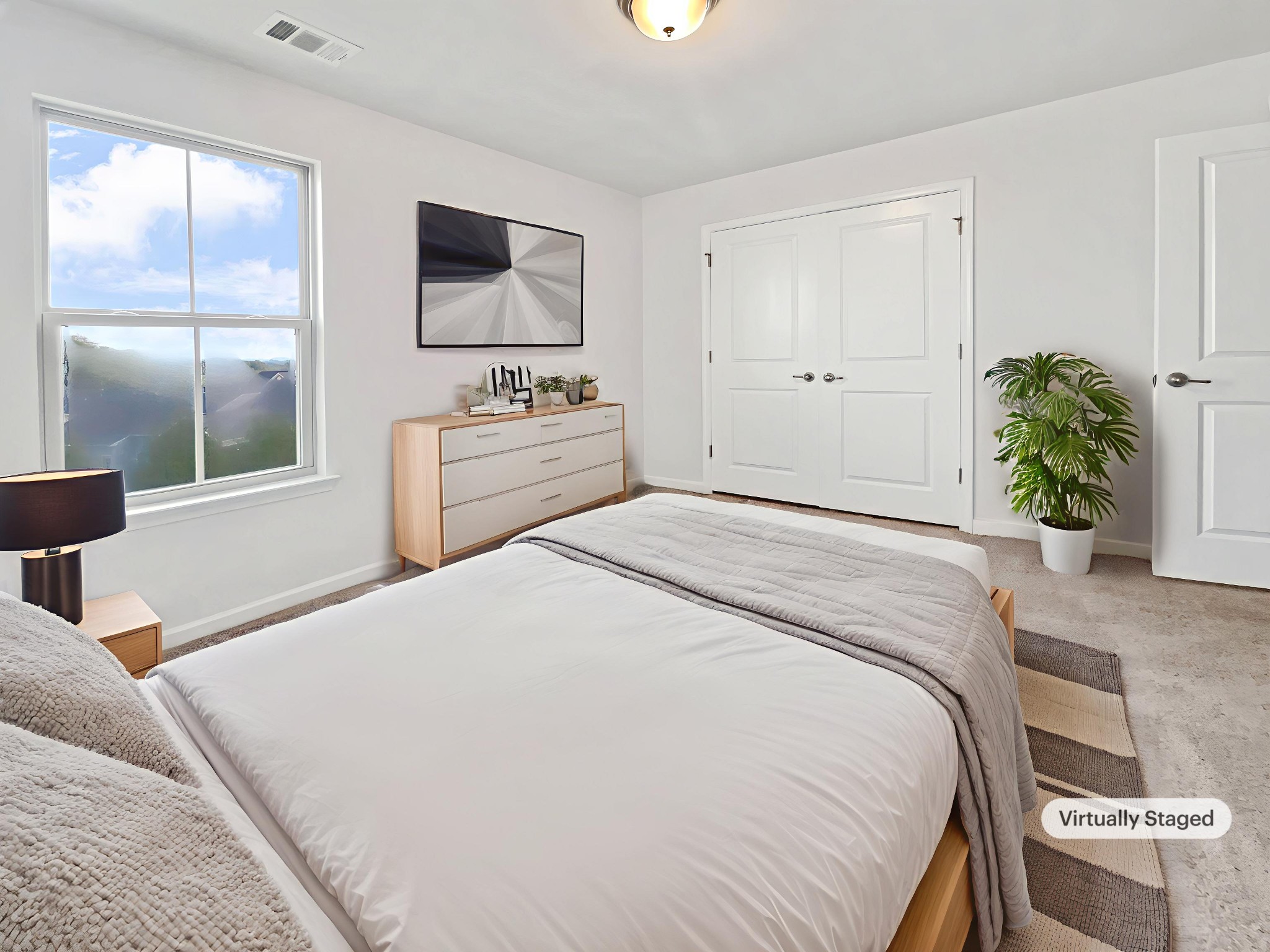 2817 Winterberry Drive Columbia, TN 38401 - Photo 6 of 26 a bedroom with a bed and a flat screen tv