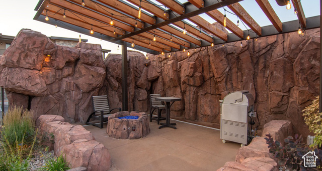 2331 Mesa Road, Unit E3 Moab, UT 84532 - Photo 55 of 71 View of patio featuring a fire pit and a pergola