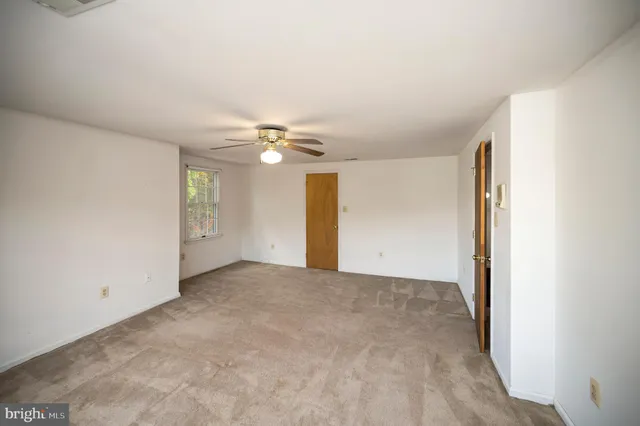 a bathroom with a sink vanity and mirror