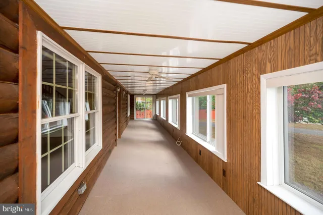 a kitchen with stainless steel appliances a sink a counter top space and cabinets