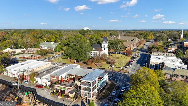 a view of yard along with seating space