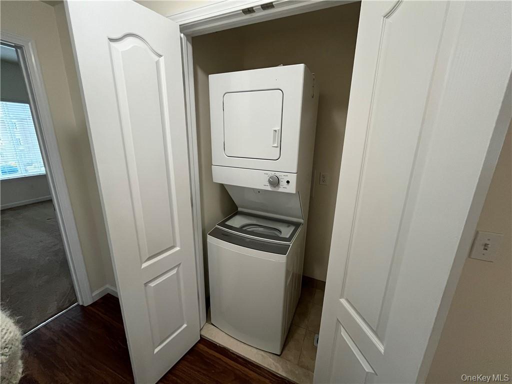 44 High Street, Unit 325 Chester, NY 10918 - Photo 12 of 16 a view of a utility room with washer and dryer
