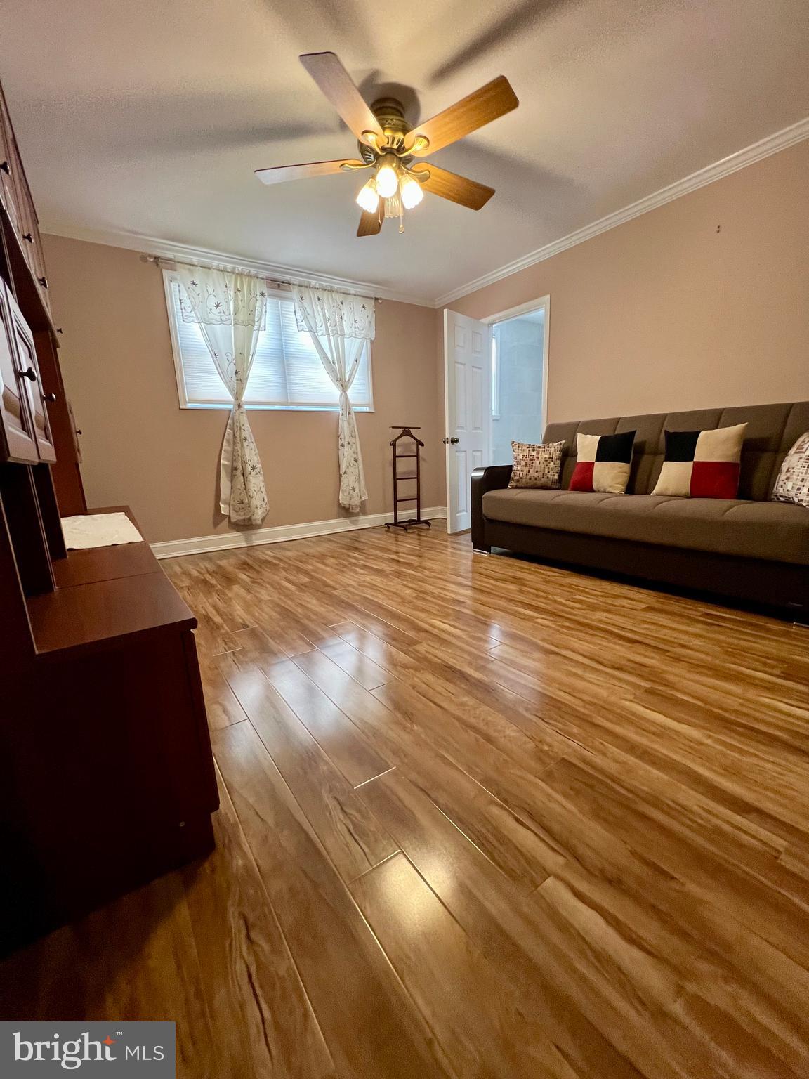 2988 Welsh Road Philadelphia, PA 19152 - Photo 25 of 38 a living room with furniture and a fireplace