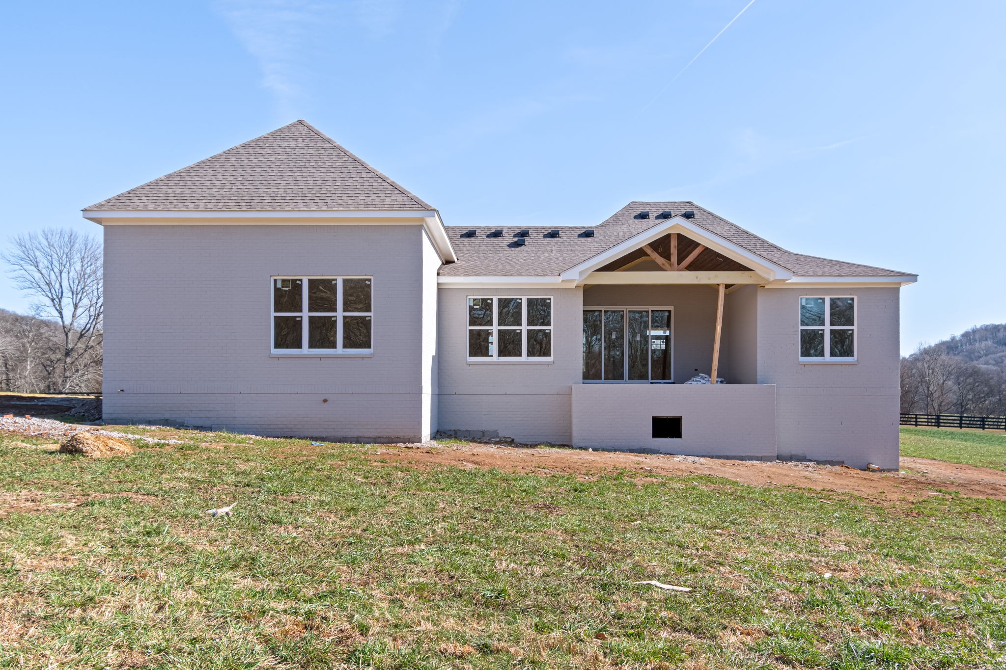 4037 Advocate Path Culleoka, TN 38451 - Photo 4 of 5 a front view of a house with a yard