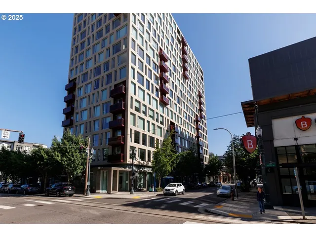 a view of a building and a street