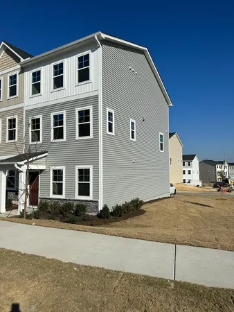 a front view of a house with garage