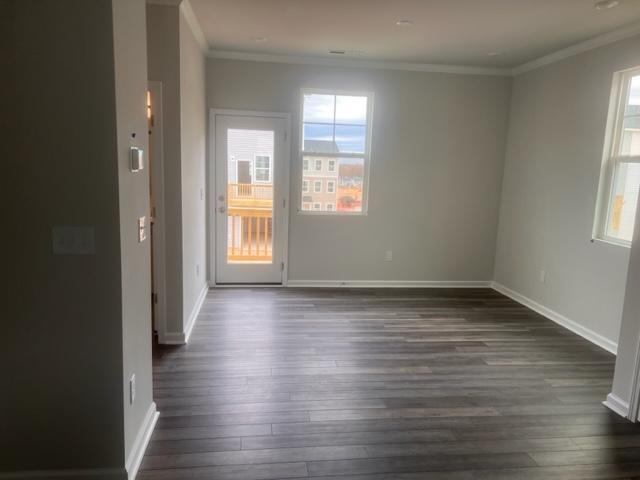 217 Ivy Vine Way Raleigh, NC 27610 - Photo 7 of 18 a view of a room with wooden floor and window