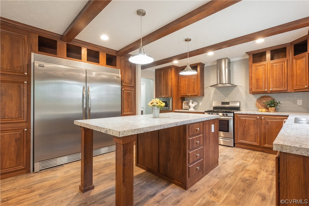 20602 Reese Road Dinwiddie, VA 23841 - Photo 11 of 50 a kitchen with stainless steel appliances granite countertop a sink a refrigerator and wooden cabinets