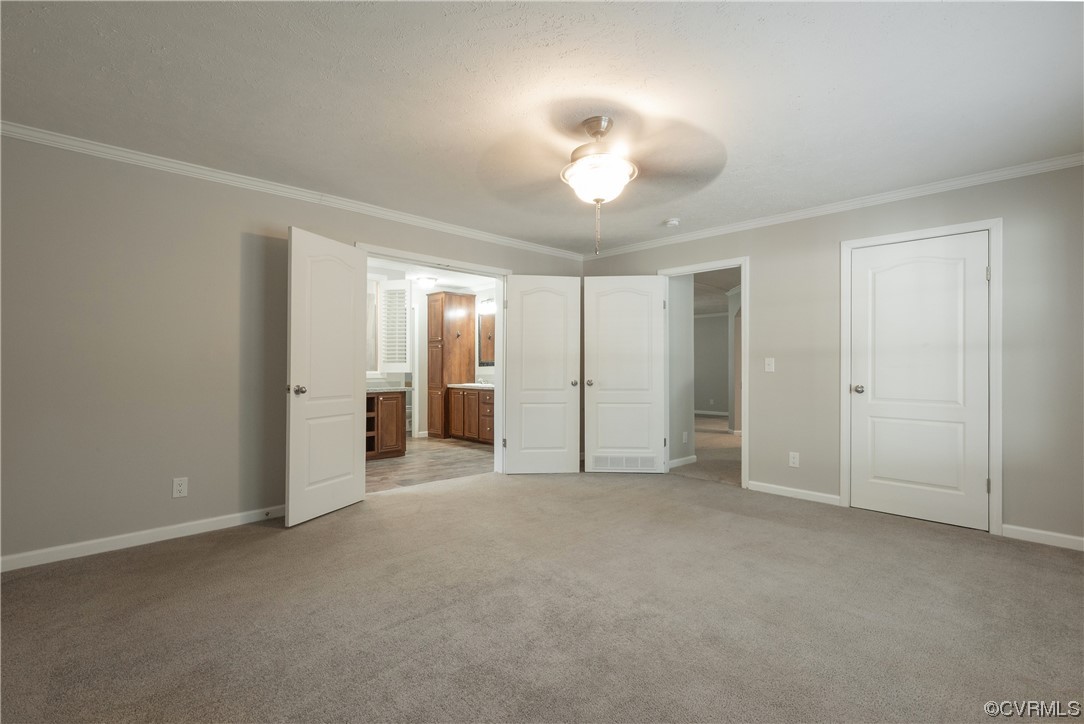 20602 Reese Road Dinwiddie, VA 23841 - Photo 13 of 50 an empty room with fan and entrance