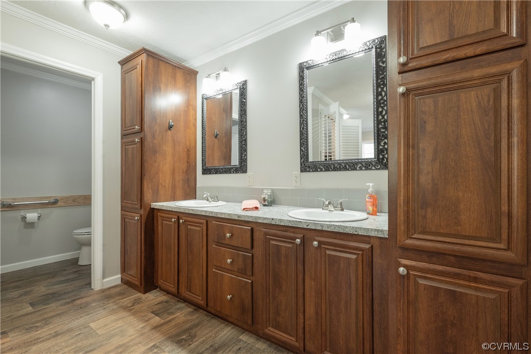 20602 Reese Road Dinwiddie, VA 23841 - Photo 17 of 50 a bathroom with a double vanity sink and mirror