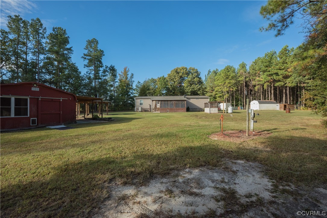 20602 Reese Road Dinwiddie, VA 23841 - Photo 26 of 50 a view of a yard with a house