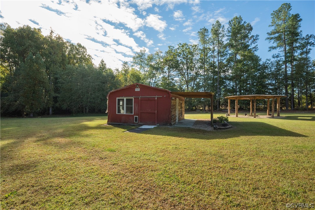20602 Reese Road Dinwiddie, VA 23841 - Photo 27 of 50 a view of a house with a yard
