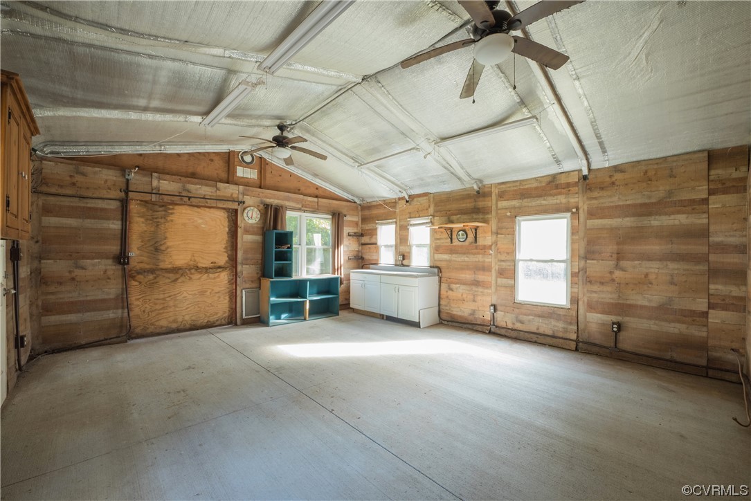 20602 Reese Road Dinwiddie, VA 23841 - Photo 28 of 50 a view of a garage room with wooden walls