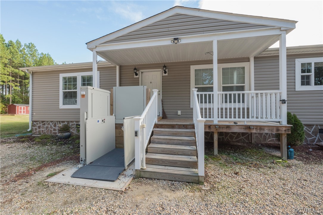 20602 Reese Road Dinwiddie, VA 23841 - Photo 32 of 50 front view of a house with a porch