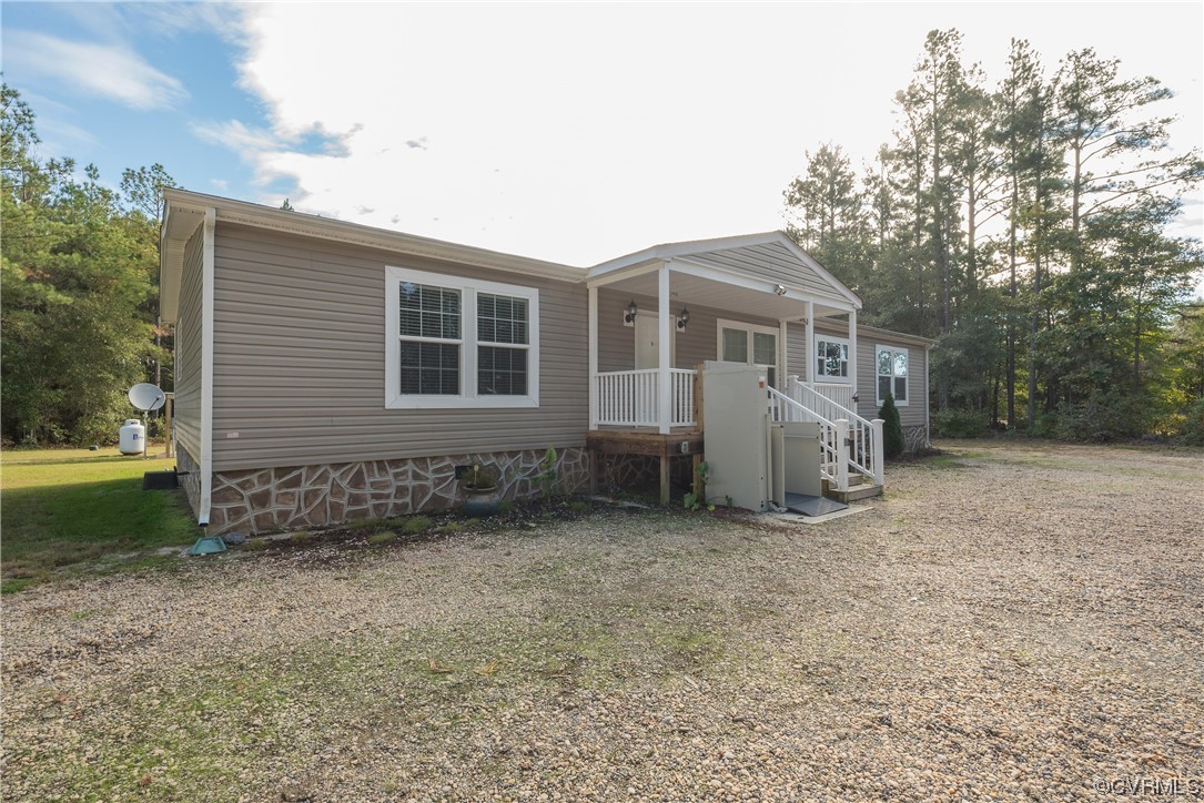 20602 Reese Road Dinwiddie, VA 23841 - Photo 33 of 50 a view of a house with a yard