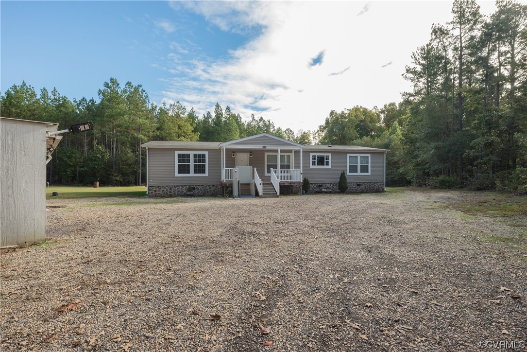 20602 Reese Road Dinwiddie, VA 23841 - Photo 35 of 50 a view of house with outdoor space and garden