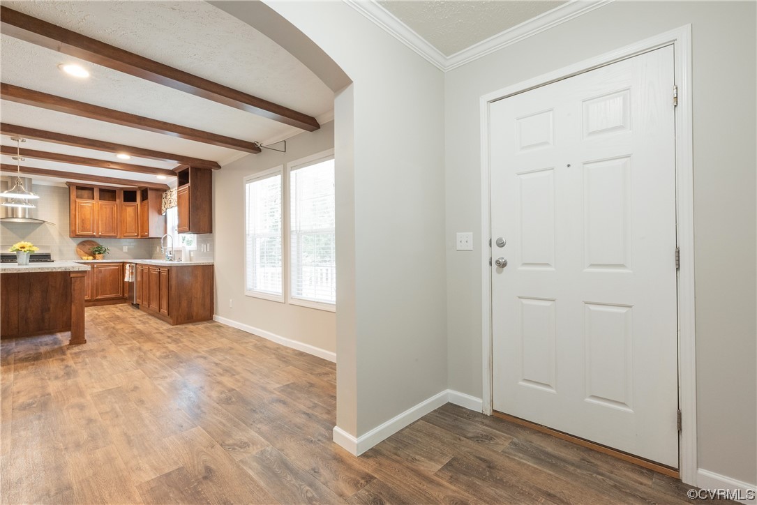 20602 Reese Road Dinwiddie, VA 23841 - Photo 4 of 50 an empty room with wooden floor and windows