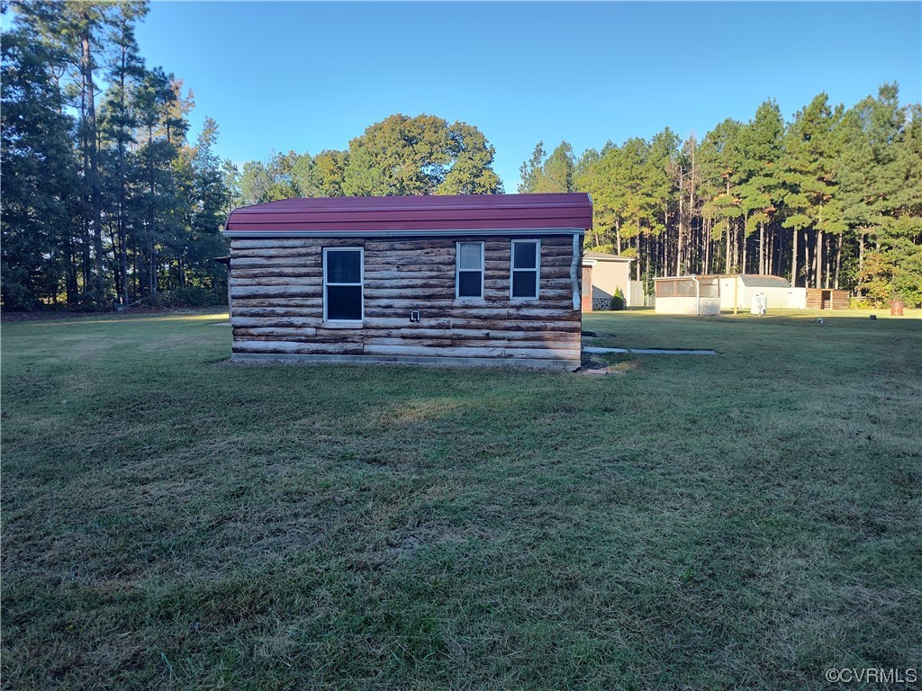 20602 Reese Road Dinwiddie, VA 23841 - Photo 49 of 50 a view of a house with a yard